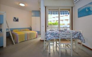 Modern functional studio with balcony in Lignano Apartment in Lignano Sabbiadoro