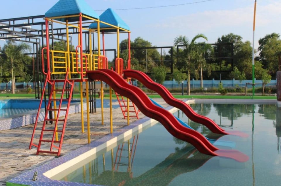 Swimming Pool Hotel Goroomgo MJR Puri with Free Pickup and Drop From Sea Beach Hotel in Puri