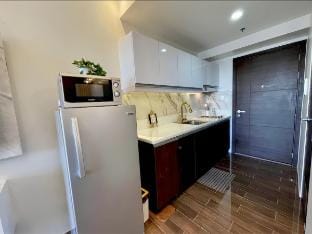 Stay in Luxury at Air Residences Apartment in Makati