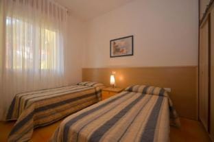 Relaxing two room apartment with AC by Beahost Rentals Apartment in Bibione