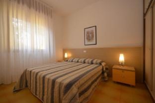 Perfect holiday aprtment for 6 guests with garden and pool by Beahost Rentals Apartment in Bibione