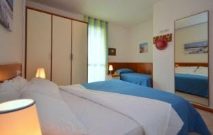 New apartment for 7 people with private garden and pool by Beahost Rentals Apartment in Bibione