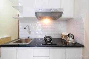 Modern and Cozy 2BR Podomoro Golf View By Travelio Apartment in West Java