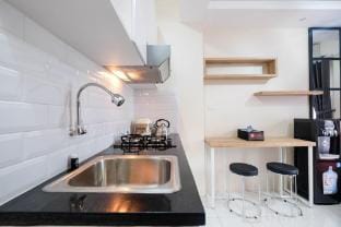 Modern and Cozy 2BR Podomoro Golf View By Travelio Apartment in West Java