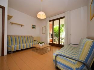 Spacious villa with garden and shared pool Villa in Bibione