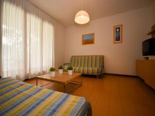 Spacious villa with garden and shared pool Villa in Bibione