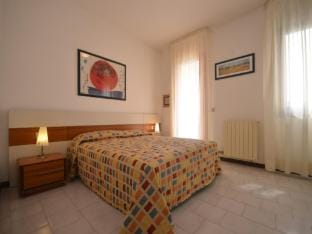 Spacious villa with garden and shared pool Villa in Bibione