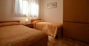 Modern two room aparment surrounded by trees in the city center Apartment in Bibione