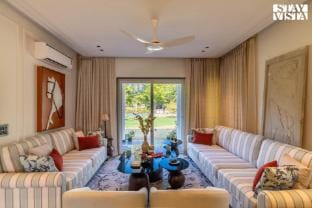 StayVista at Barton Estate w/ Outdoor Pool-Manesar Villa in Haryana