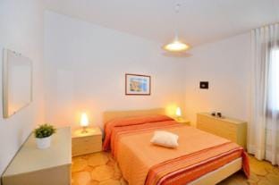 Contemporary apartment for 5 people with small garden by Beahost Rentals Apartment in Friuli-Venezia Giulia