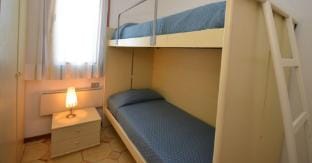 Contemporary apartment for 5 people with small garden by Beahost Rentals Apartment in Friuli-Venezia Giulia
