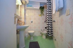 Bright apartment for 4 people in a building close to the beach Apartment in Friuli-Venezia Giulia