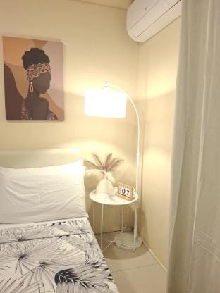 Snuggle in Bed Staycation near Mactan Airport Apartment in Lapu-Lapu City