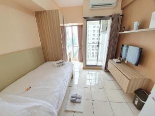 Comfort, and Homey Studio Apart at Gading Serpong Apartment in West Java