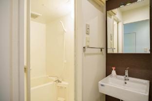 黒門市場徒歩5分 通天閣 難波エリア徒歩圏内 トイレと浴室付きまるまる貸切 エレベーター9階904 Apartment in Osaka