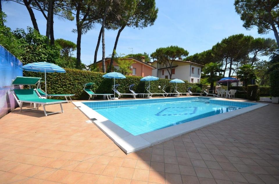 Fully equipped flat in a pinewood area with swimming pool Hotel in Lignano Sabbiadoro