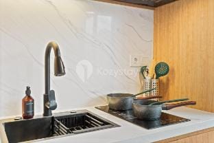 Olaia by Kozystay | 2BR | Pool Access | Nusa Dua Apartment in Kuta Selatan