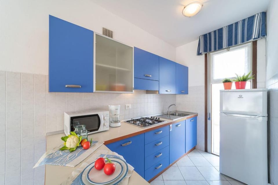 Spacious apartment near beach with pool Apartment in Lignano Sabbiadoro