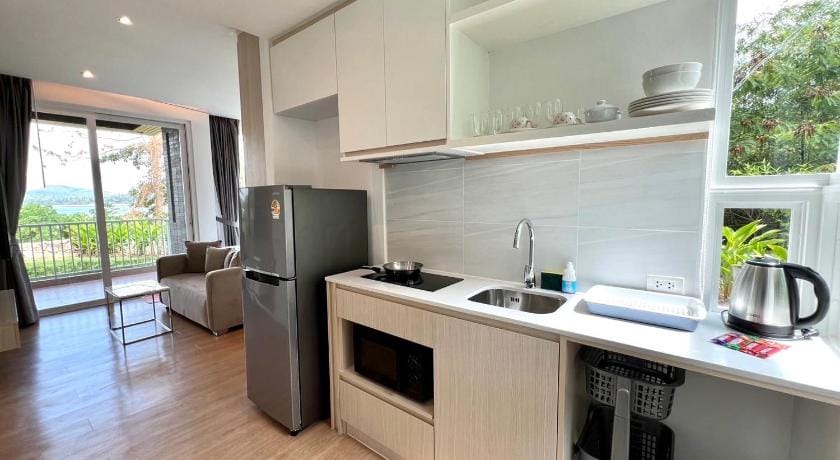 Beachfront Bliss at Naiyang Phuket by ALPHATEL Apartment in Phuket
