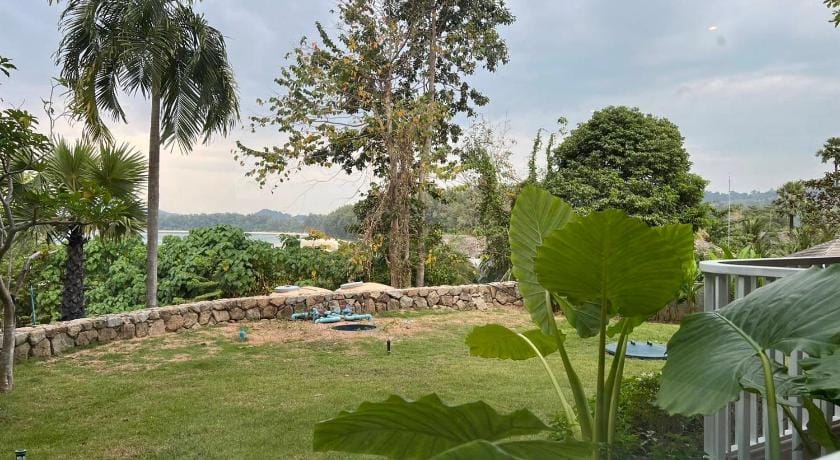 Beachfront Bliss at Naiyang Phuket by ALPHATEL Apartment in Phuket