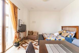 Budget friendly unit with ROOFTOP SWIMMING POOL Apartment in Lapu-Lapu City