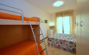 Airy flat with terrace steps from the beach Apartment in Bibione