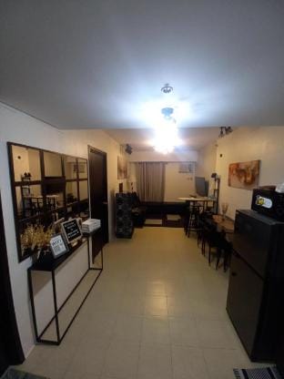 1BR: with pool + ideal to Family and Friends Apartment in Pasig