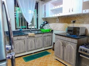 3BR, 500m to Source of the Nile with A/C & Gardens Apartment in Uganda