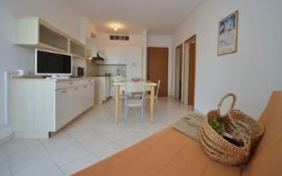 Comfortable holiday apartment with shared pool and seaview terrace Apartment in Lignano Sabbiadoro