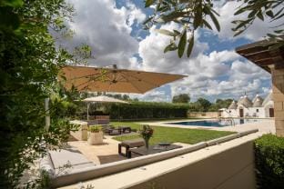 Trullo Siamese by Miani Group Villa in Province of Taranto
