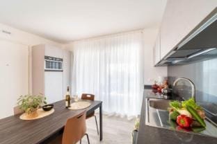 Modern apartment with solarium and panoramic lagoon and seaview Apartment in Lignano Sabbiadoro