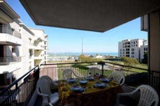 Charming loft apartment with a beautiful solarium area Apartment in Lignano Sabbiadoro
