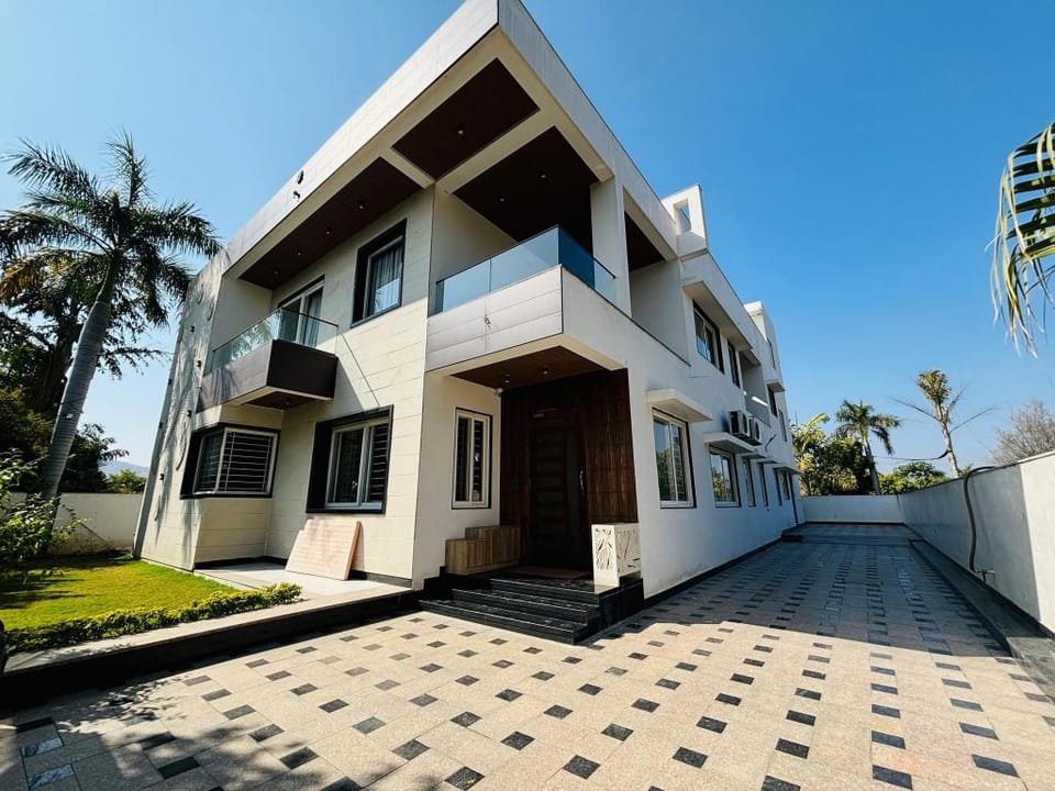 The Flora Homestay | Near Goverdhan Sagar Lake Vacation rental in Gujarat