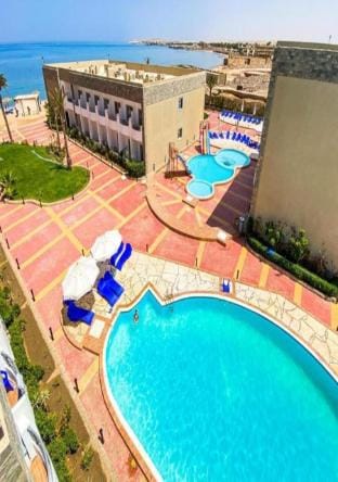 Furnished & Kitchinee Chalets, BeachFront, WI-Fi Apartment in Hurghada