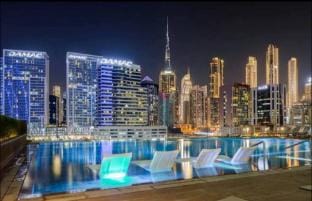 Spacious 1Bedroom, Burj views, Infinity Pool  Jacuzzi Apartment in Dubai