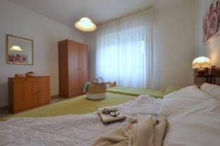 Sunny holiday apartment not far from the beach Apartment in Lignano Sabbiadoro