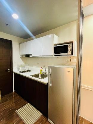 Cozy 1 bedroom with balcony in Air Residences Vacation rental in Makati