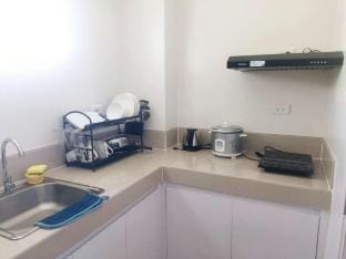 Relax at Trees Residences Apartment in Quezon City