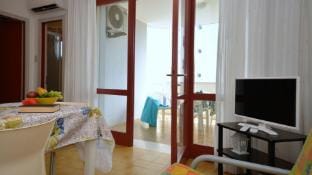 Colorful apartment with terrace by Beahost Rentals Apartment in Bibione