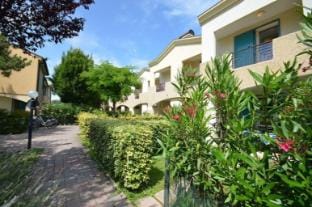 Fully equipped apartment with private garden and pool Apartment in Bibione