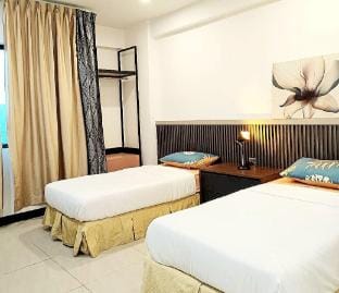 Tranquil & Cozy 3-Bedroom Oasis in Likas Square Apartment in Kota Kinabalu