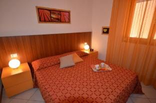 Modern flat with a beautiful terrace by Beahost Rentals Apartment in Bibione