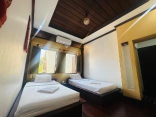 Twin Room 1 at Norasingh Guest House Vacation rental in Luang Prabang