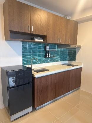 2Br QC Furnished Condo w/300mbps Net Free Pool Use Vacation rental in Quezon City
