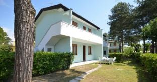 Comfortable two room apartment with garden and swimming pool by Beahost Rentals Apartment in Bibione