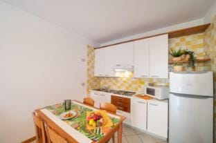 Beautiful three room flat with large gargen and terrace Apartment in Bibione