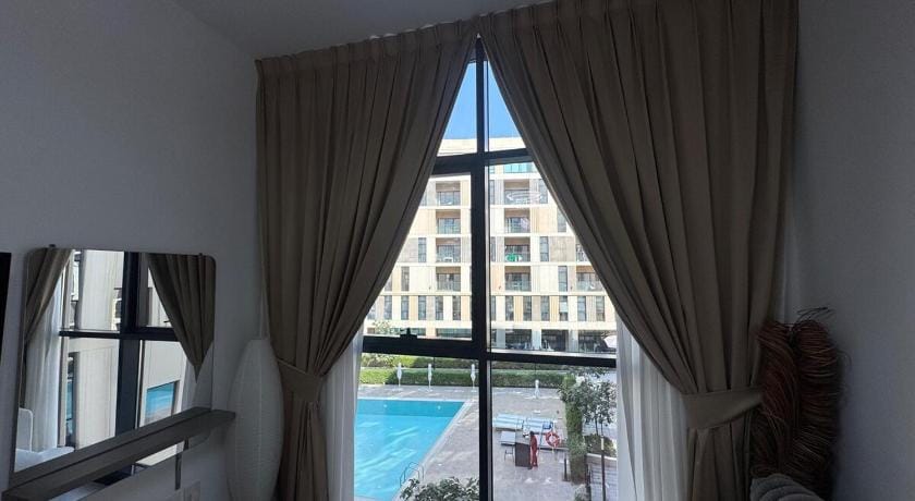 Panaromic pool view 1BR Apartment in Al Sharjah