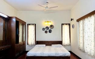 Room in a Bungalow with Garden View Villa in Bengaluru