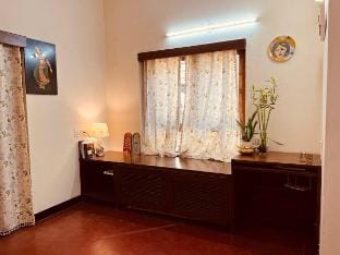 Room in a Bungalow with Garden View Villa in Bengaluru