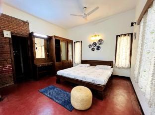 Room in a Bungalow with Garden View Villa in Bengaluru